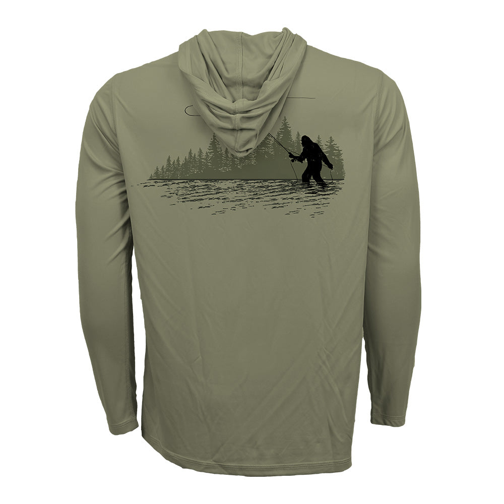 moss green hooded long-sleeve sun shirt featuring a black silhouette of a squatch fly angler casting in a river with tree line backdrop on the back.