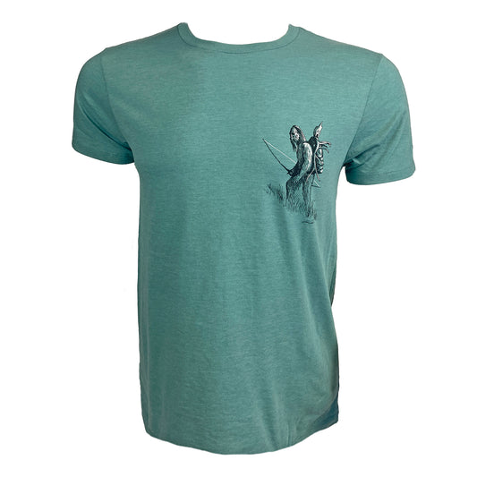 Blue Green tee with artistically rendered sasquatch carrying bow and elk skull on wearers left chest.