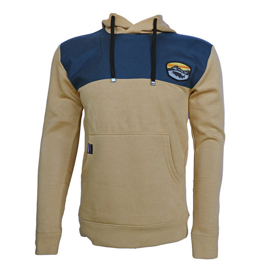 buck skin hoodie with navy yoke with a badge on the front left chest showing a fish silhouette and mountains with a sunset