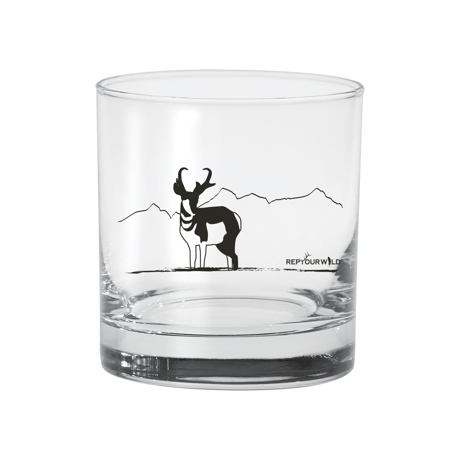 a clear glass with an antelope on the side in black ink