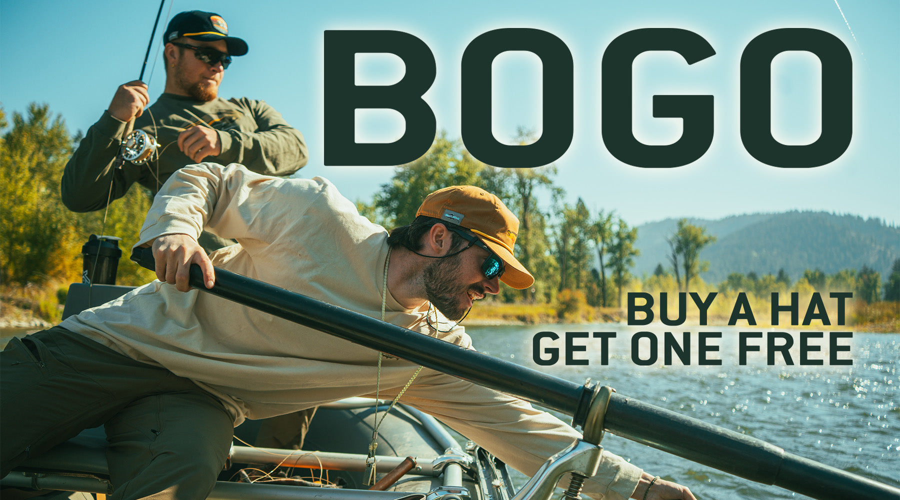 Text on image says "BOGO" and then "buy one get one free" the background is of two fly anglers working to land a fish out of a raft.