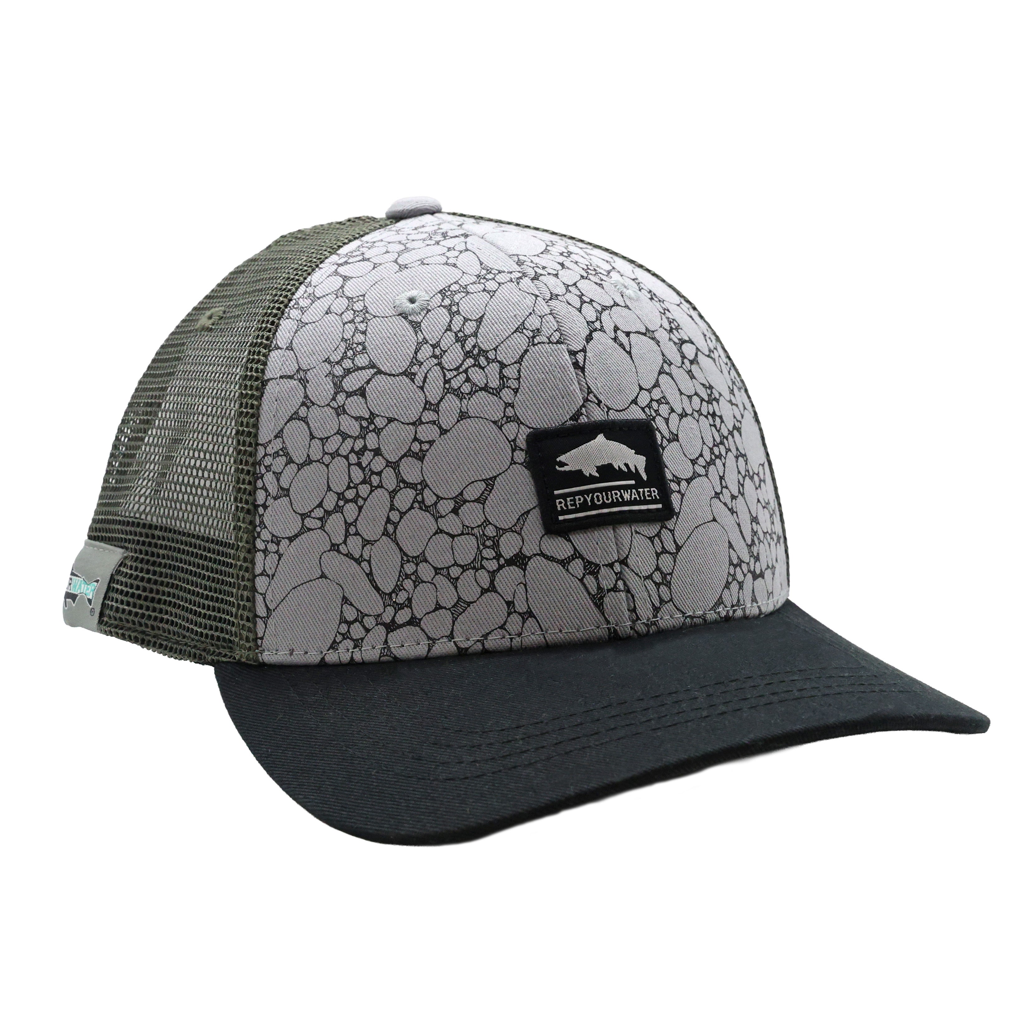 Sage green cap with black fish silhouette on textured pattern front panel