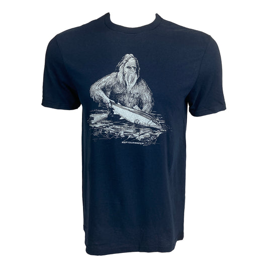 a navy short sleeve shirt with a drawing of sasquatch holding a fish in black and white