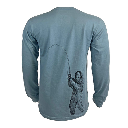 Blue gray long sleeved tee shown from the back with artistically rendered fishing sasquatch on wearer's lower right back.