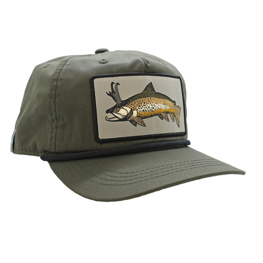 A green hat with a black rope. The front features a trout with pronghorn antlers on a blue background.