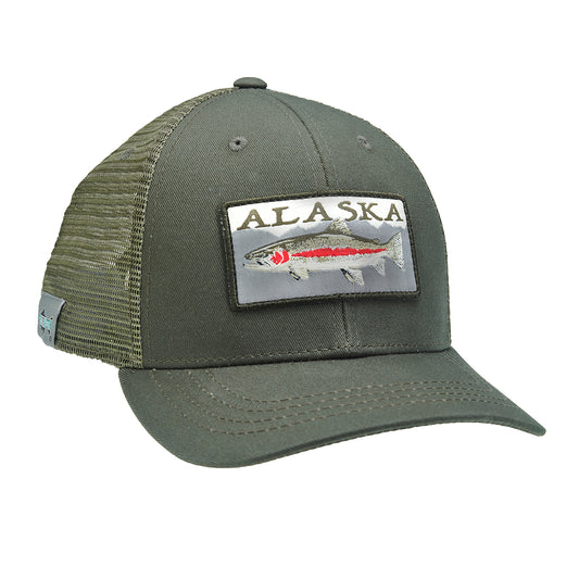 A hat with green mesh in back and green fabric in front displays a patch that says alaska and has a rainbow trout