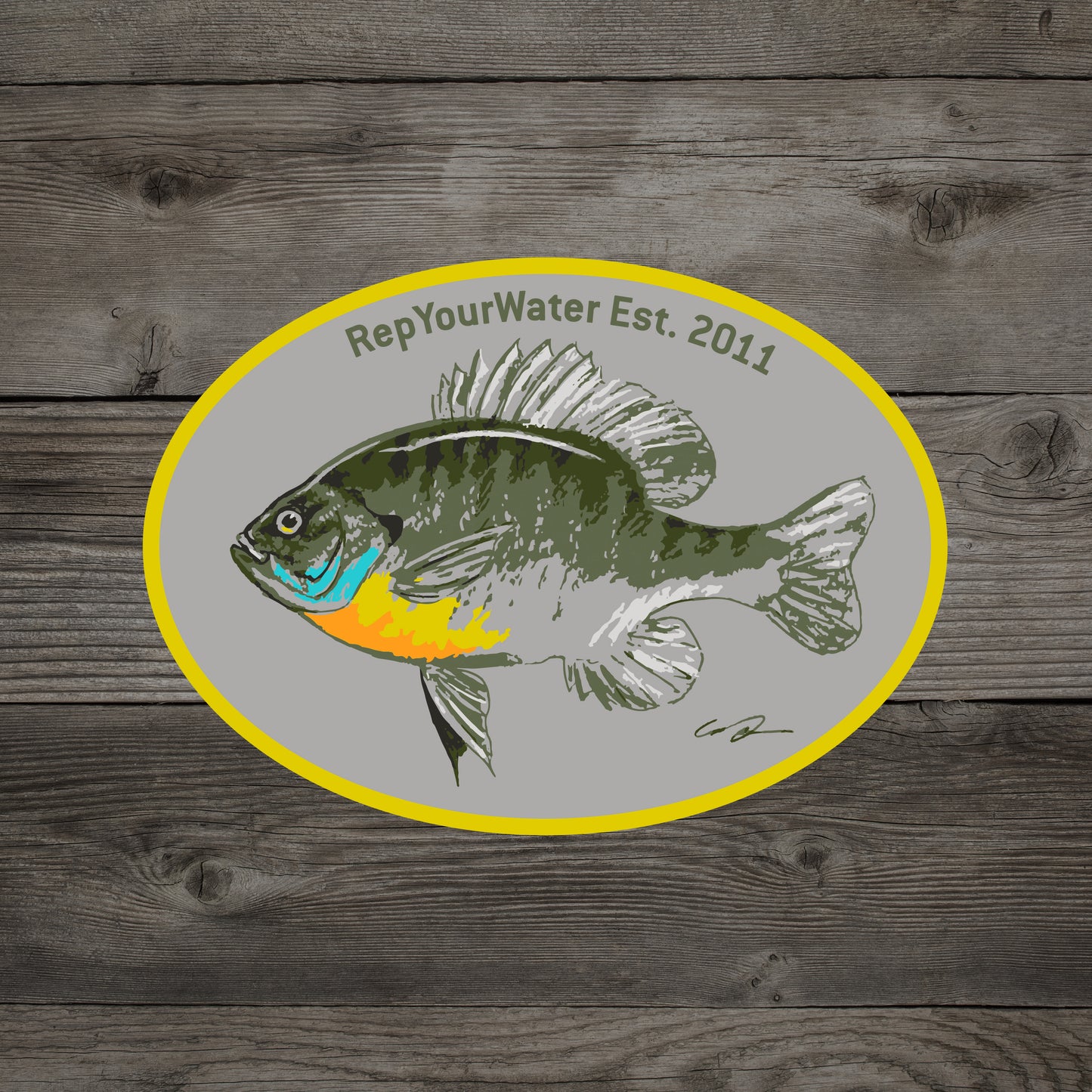 A wood background with a mockup of a sticker showing a bluegill fish and the words repyourwater est 2011