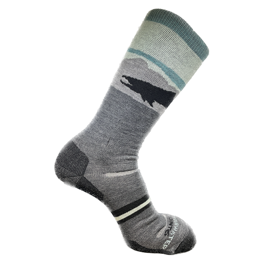 light gray/blue socks with a mountain range and trout silhouette