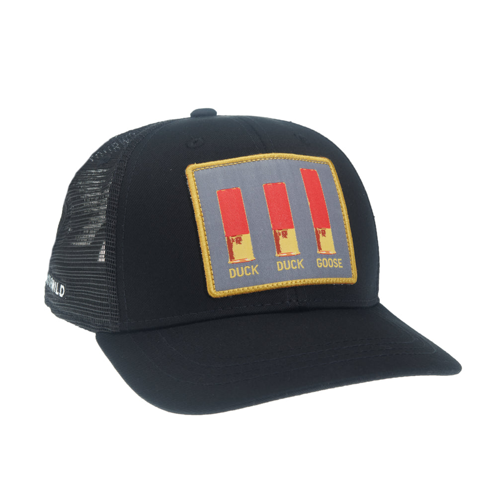 A hat with black mesh in back and black fabric in front has a rectangular patch that shows 3 shot gun shells that says duck duck goose below them