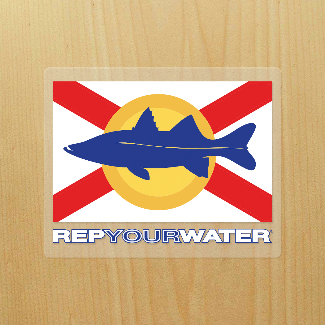 Shows a rectangular sticker with a blue snook that has a red X behind it.