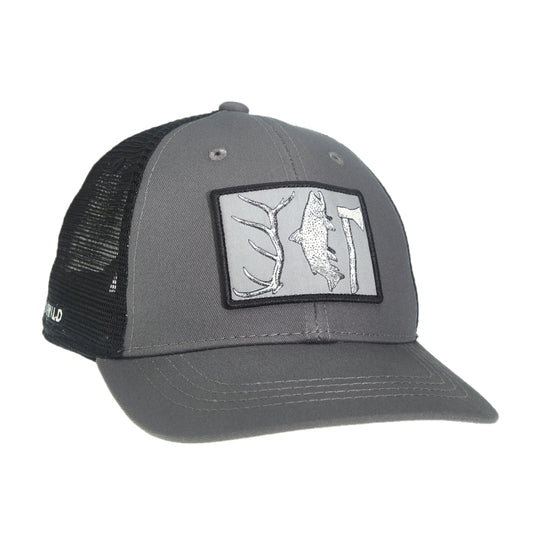 A hat with black mesh in the front and gray fabric in the front. The hat features a rectangular patch in the front with an antler, a trout and a hatchet on it.