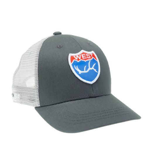 A hat with white mesh in the back, gray fabric in the front and a patch on the front of the hat in the shape of an interstate sign. The patch features the word "WEST" and an elk antler with montains.
