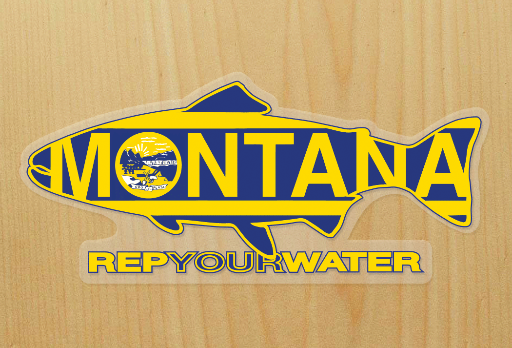 A sticker shown on a wood background. The sticker is in the shape of a trout with the word "MONTANA" inside of it. Underneath is the word "REPYOURWATER".