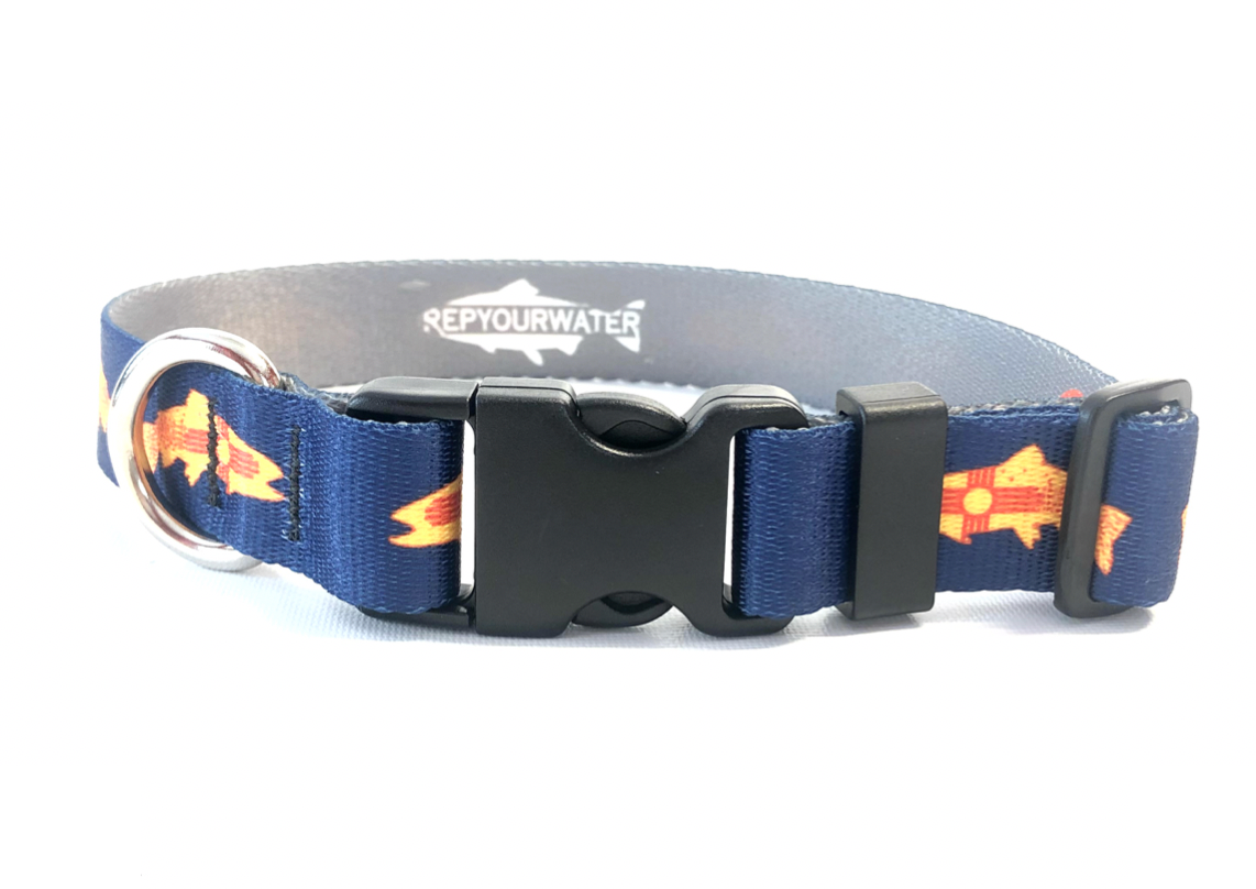 Blue nylon dog collar with plastic clasp and metal D ring featuring a trout silhouette filled with the NM flag.