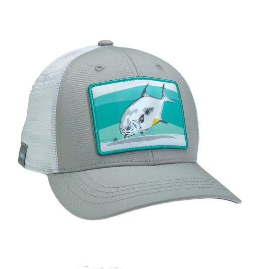 A hat with white mesh in back and gray fabric on the front has a rectangular patch which shows a permit eating a a crab fly