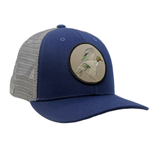 A hat with gray mesh and blue fabric in front has a circular patch with a flying duck on it