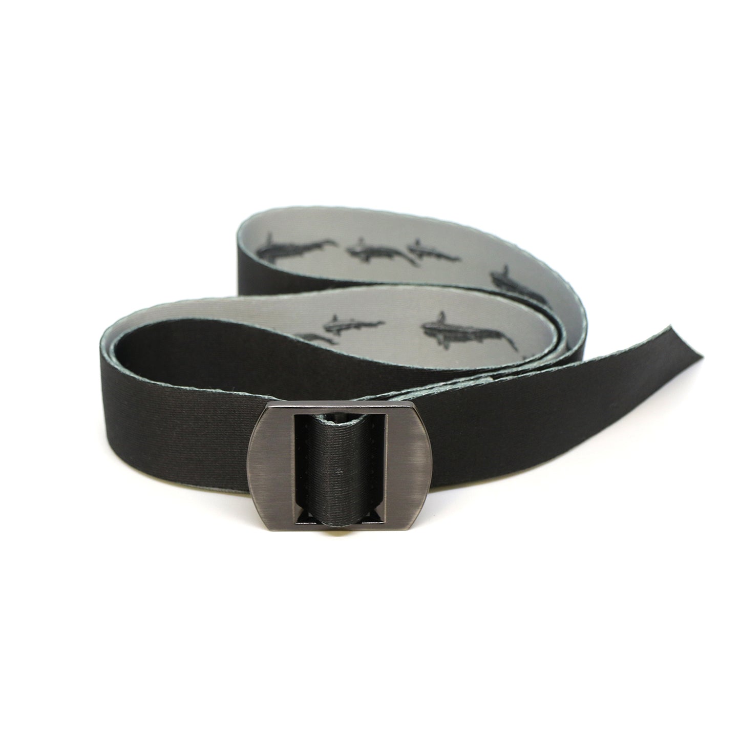 A nylon belt with a metal front buckle has a swimming trout on a gray background print, showing the black reverse side of the belt