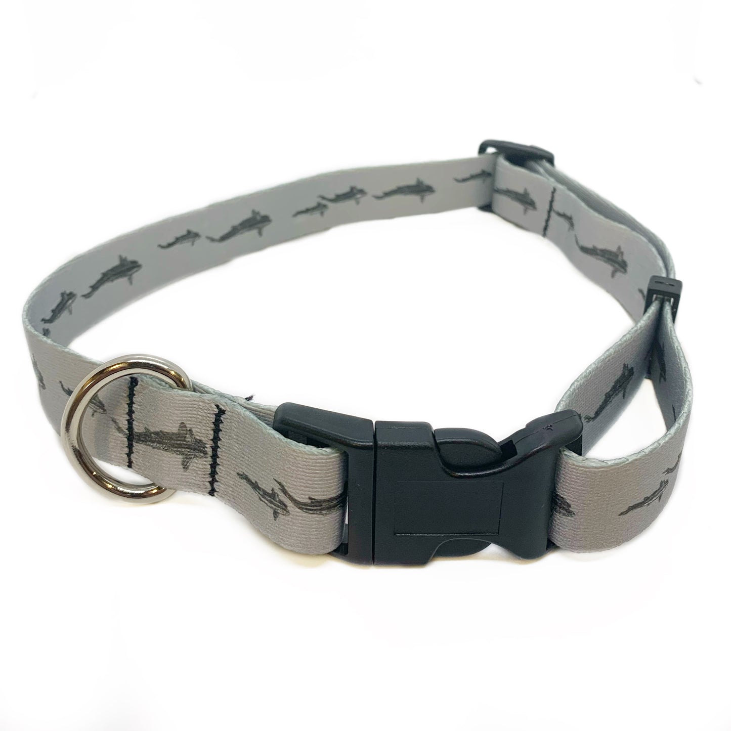 A gray nylon dog collar is shown. Trout swimming from above is printed on it.